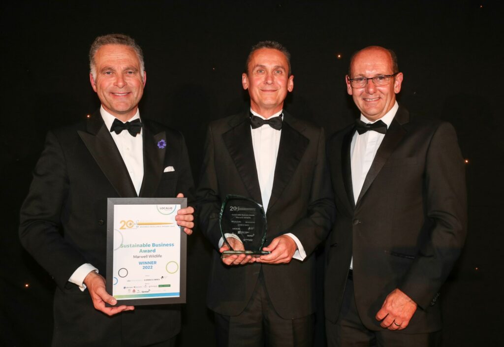 Chief Executive James Cretney and Dr duncan East receive an award at the Winchester Business Awards