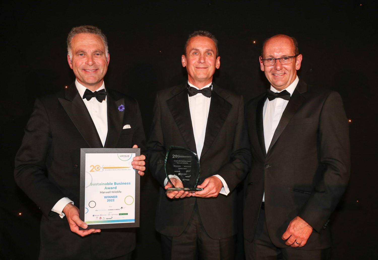 Chief Executive James Cretney and Dr duncan East receive an award at the Winchester Business Awards