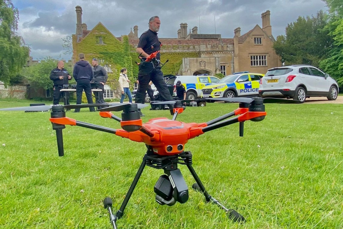 A Hampshire Police drone on the grass in front of Marwell Hall at Marwell Zoo