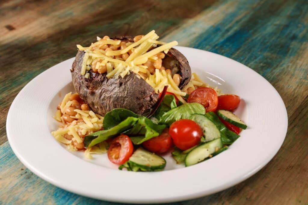 A jacket potato with cheese, baked beans and salad at The Keeper's Kitchen