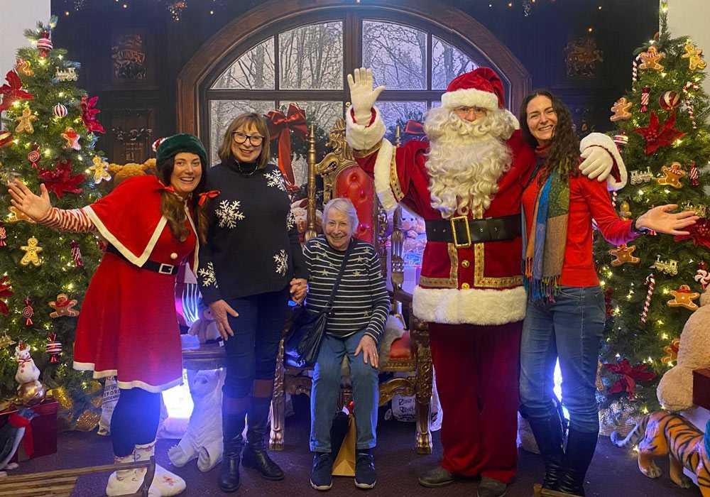 Nonagenarian Nannie Liz McDonald and her family with Santa at Marwell Zoo's Christmas at Marwell Hall event. Photo provided by Liz McDonald / Siobhan Mason