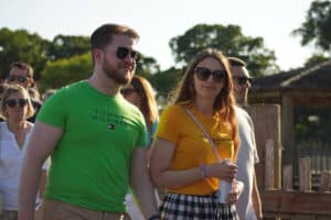 Guest in sunglasses enjoy the summer sunshine while at a Summer Evening safari at Marwell Zoo