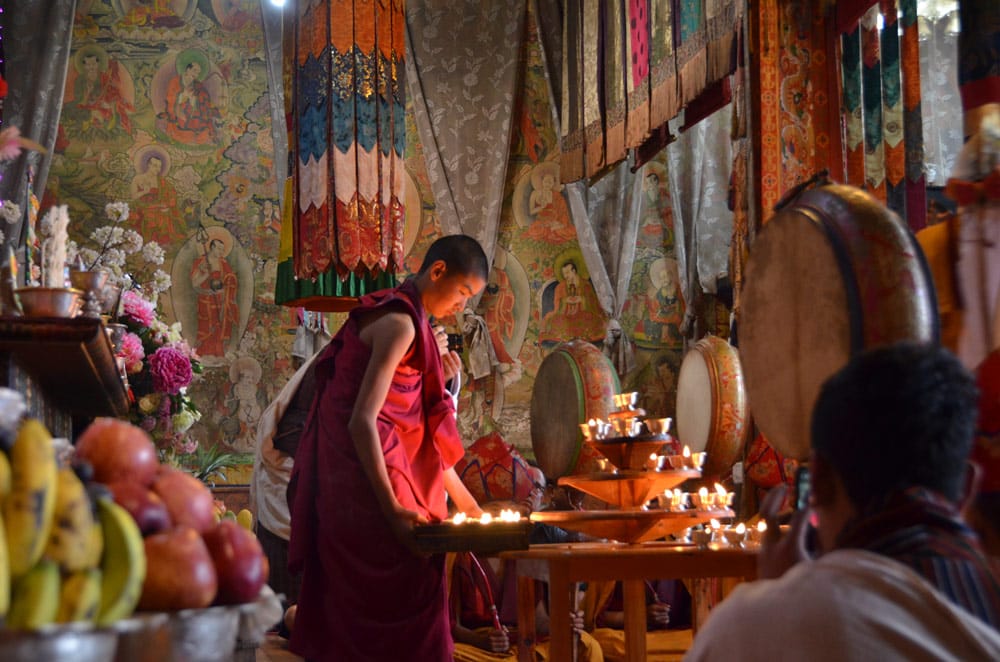 A monk in a temple in Bhutan